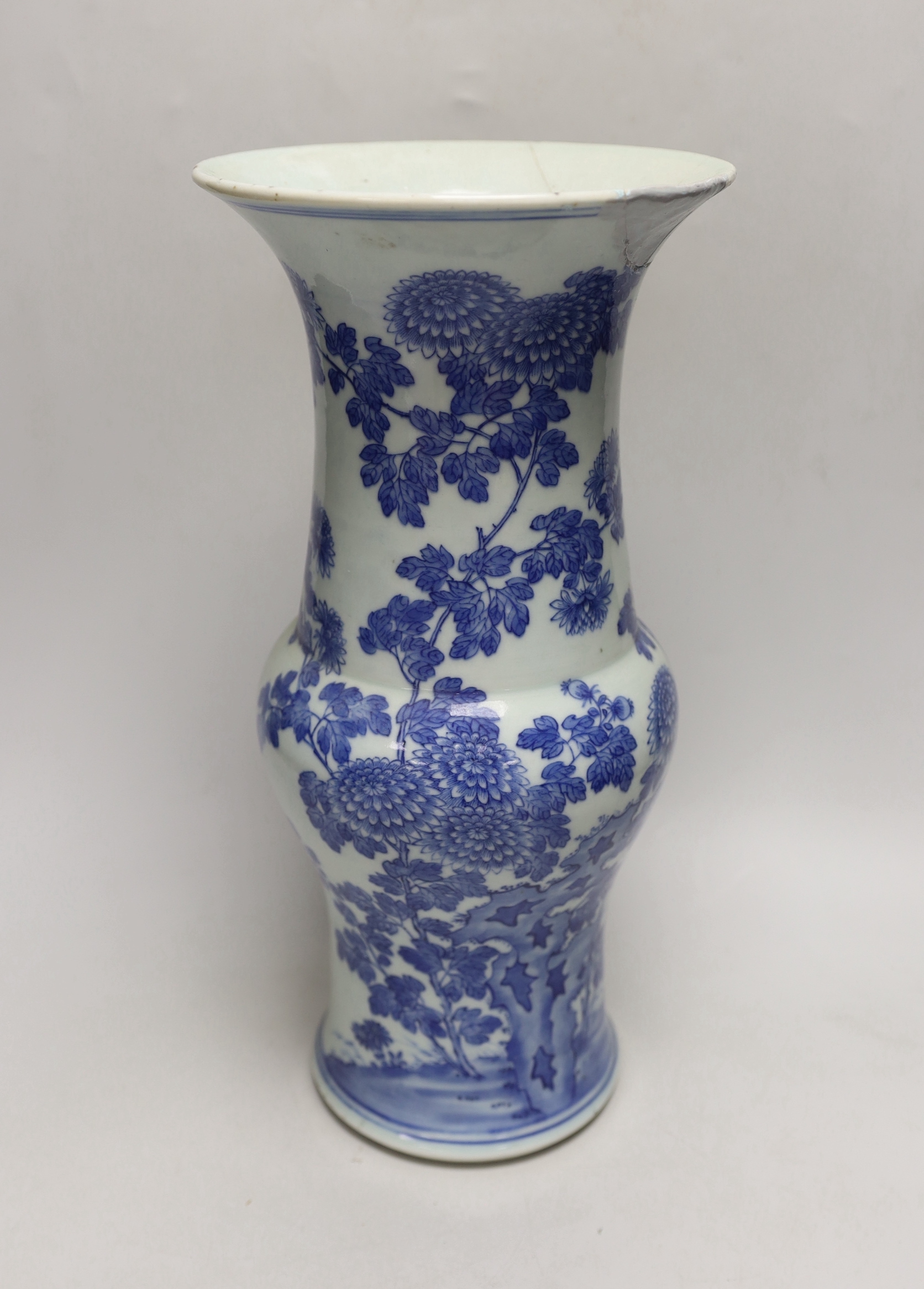 A Chinese blue and white gu shaped vase, 37.5cm high (a.f.)